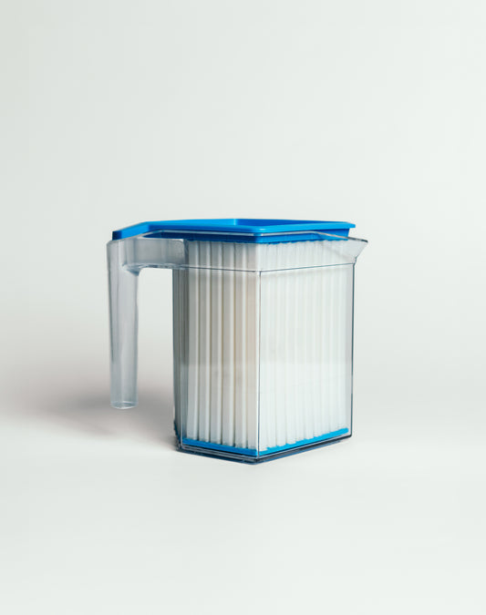A white Coldwave coffee cooling device with a blue lid and band, designed to snap-chill hot brews into iced coffees.